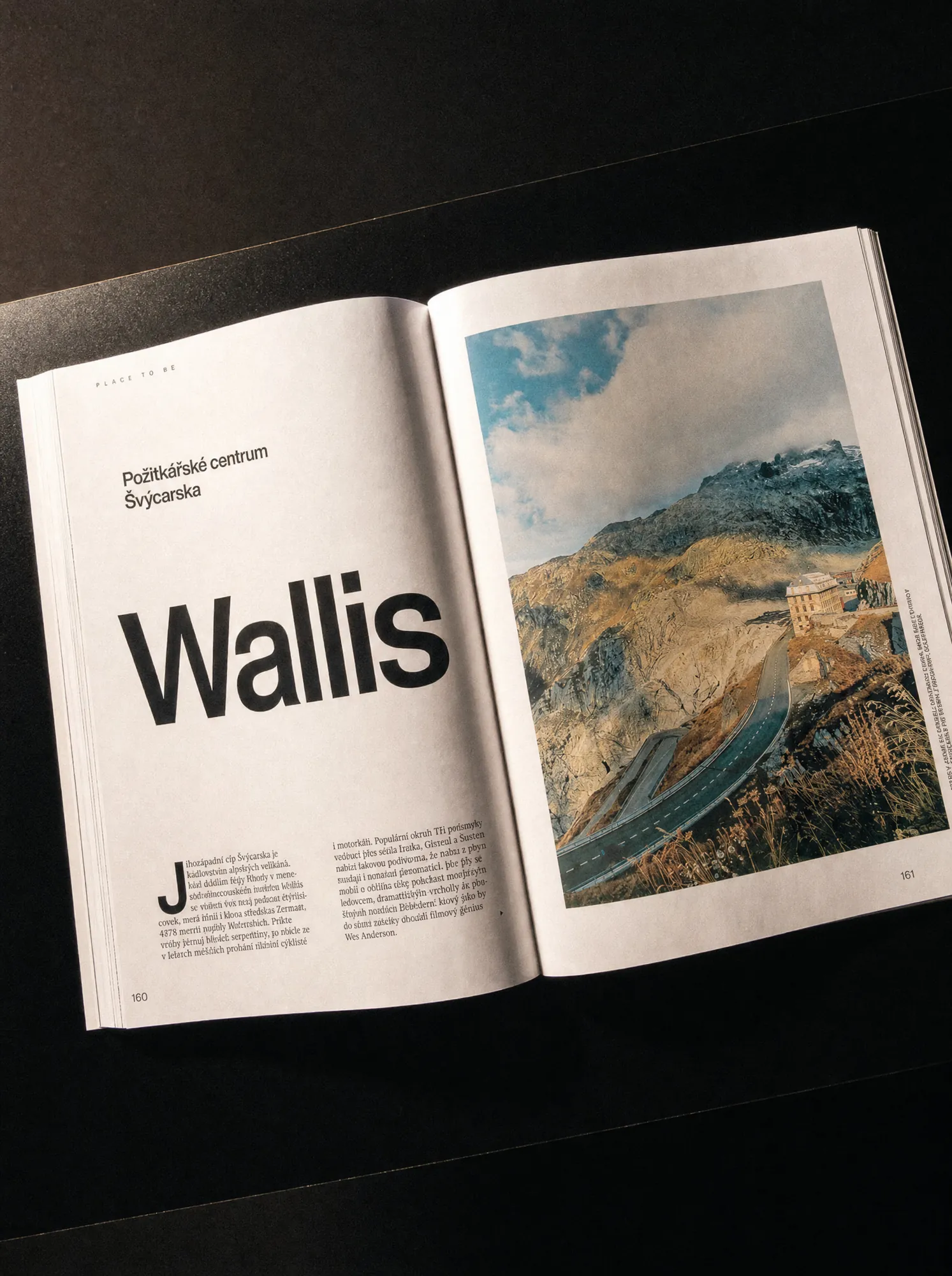 Wallis travel feature with a vertical title and mountain photography