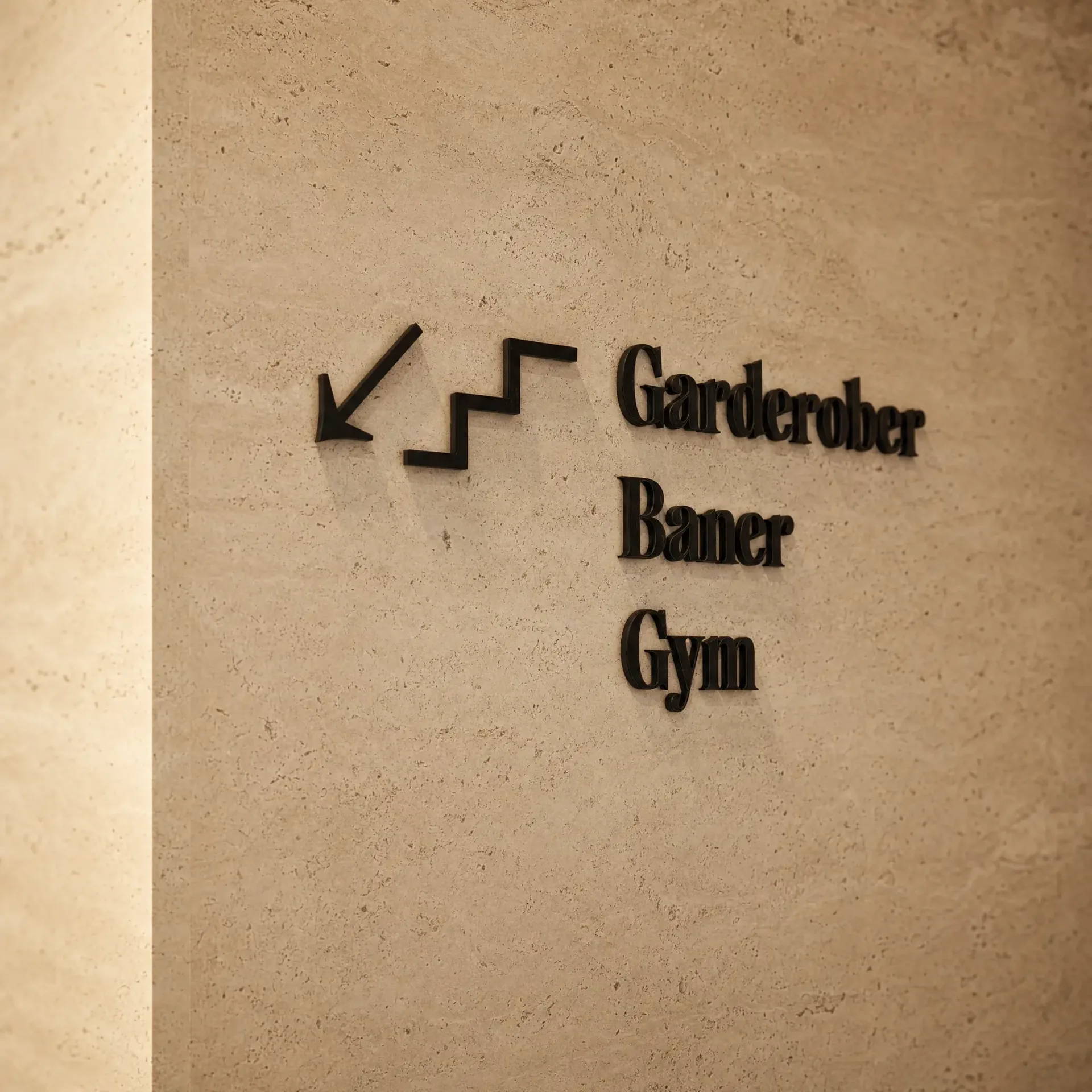 Directional signage for the changing rooms, courts and gym